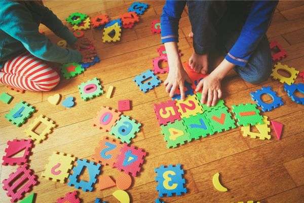 Kids playing with letters